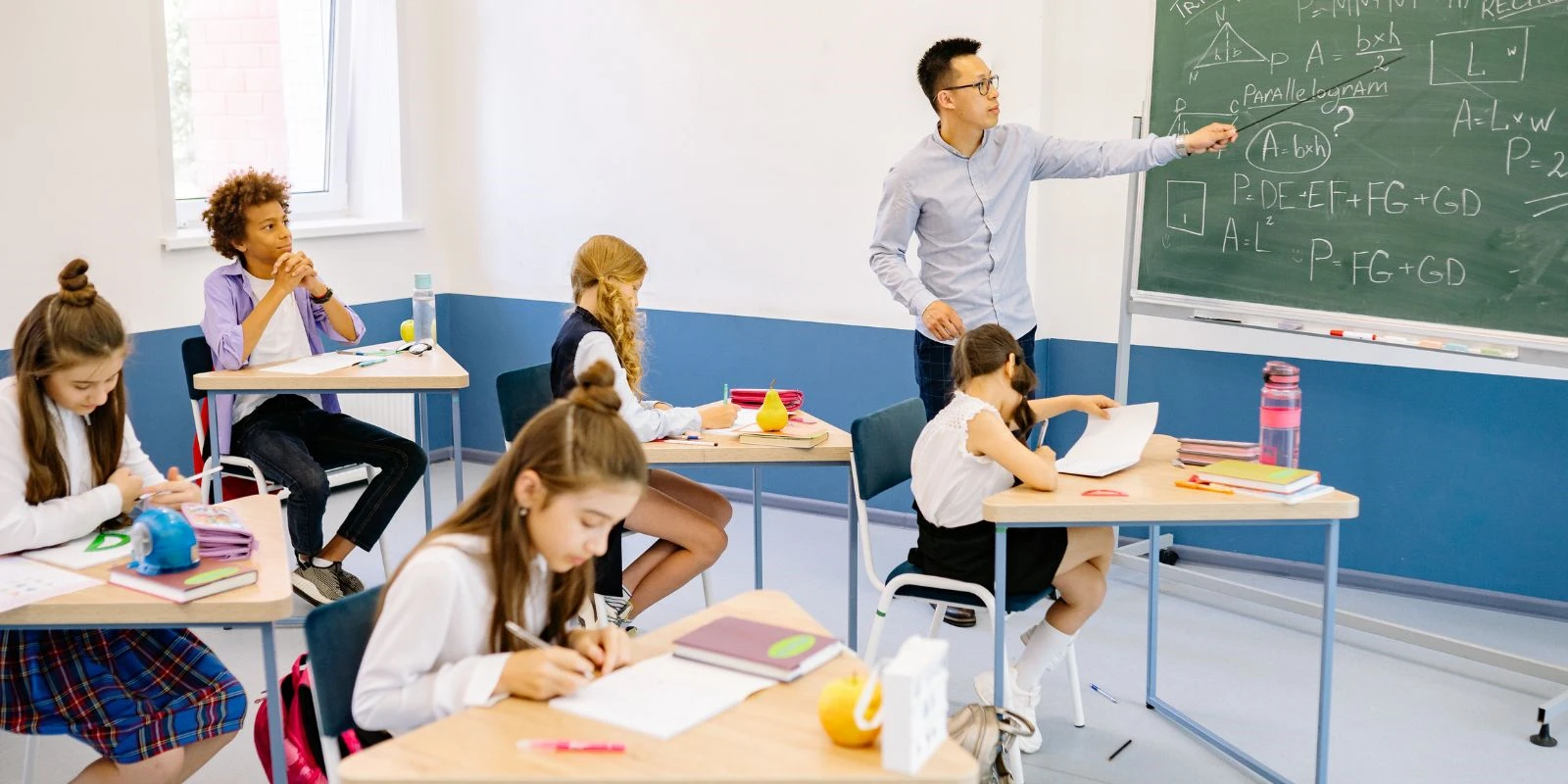 US expat teacher in a UAE classroom