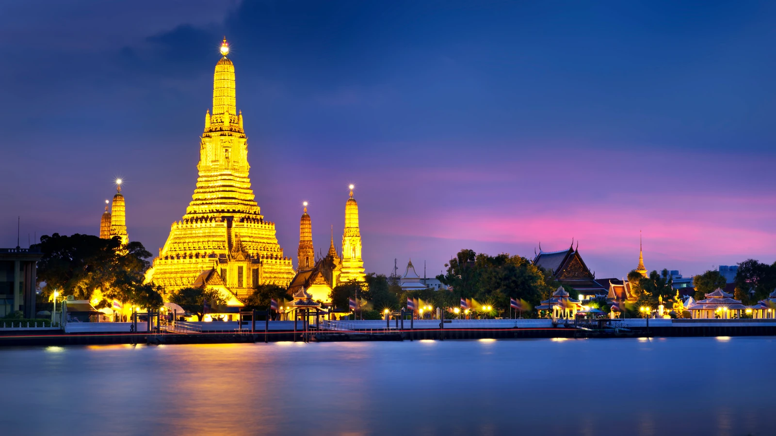 Wat Arun temple at night, Bangkok, for property investing tax strategies
