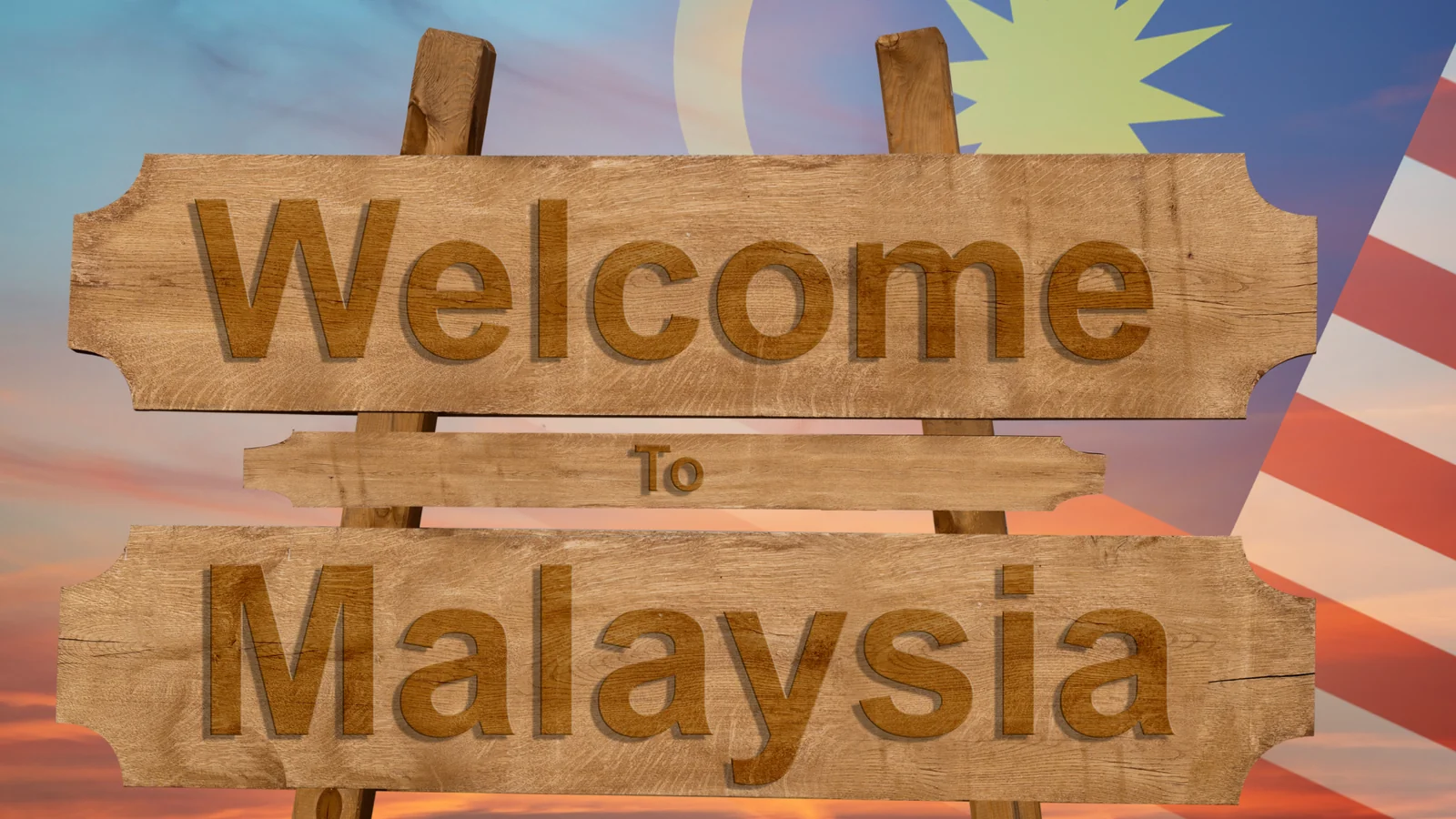 Welcome to Malaysia sign with national flag